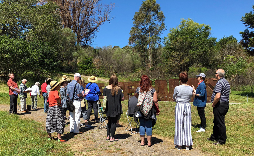 a group of people standing on a field