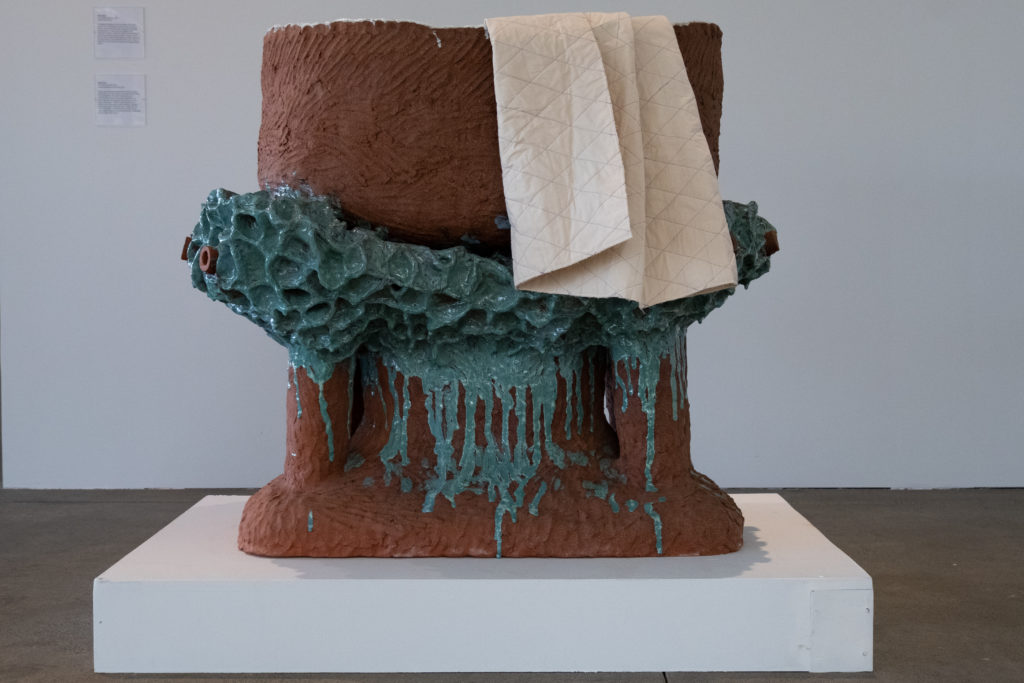 Nicki Green, The Porous Sea (Tub), 2019. Glazed earthenware with cotton quilt.